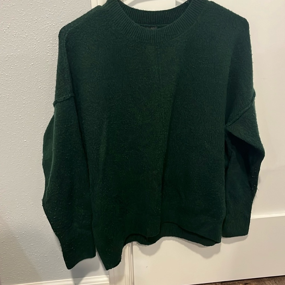 dark green sweater